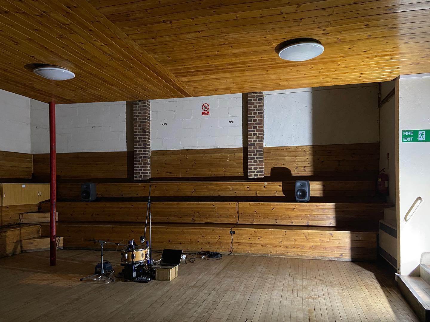 entirely wooden room set up for solo drum